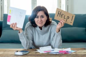 woman asking for help in paying off debts