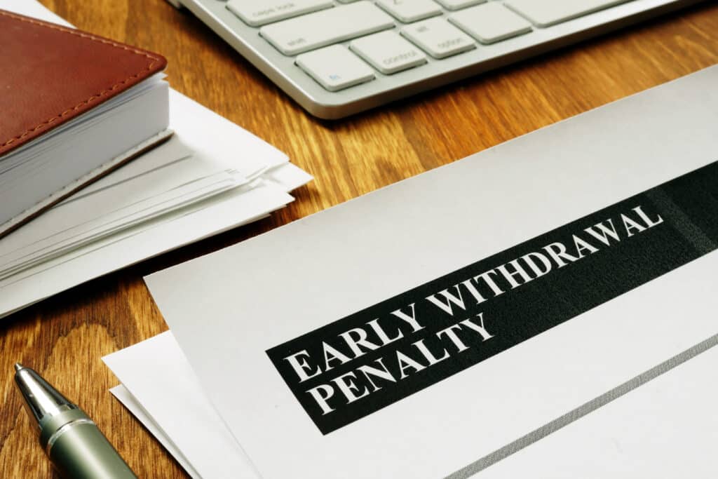 Early withdrawal penalty letter on the desk.